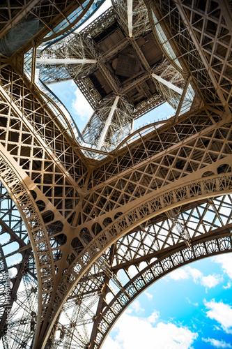 Partial view underneath the Eiffel Tower in Paris, France