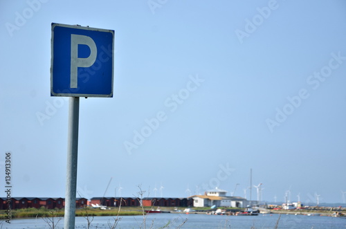 parking sign on a background inoperative at this time of year, a small port in Sweden photo