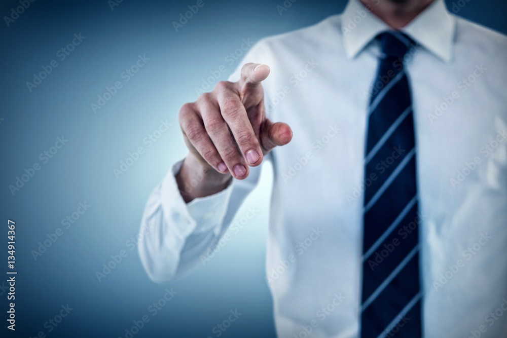 Composite image of midsection of man pointing Composite image of midsection of man pointing