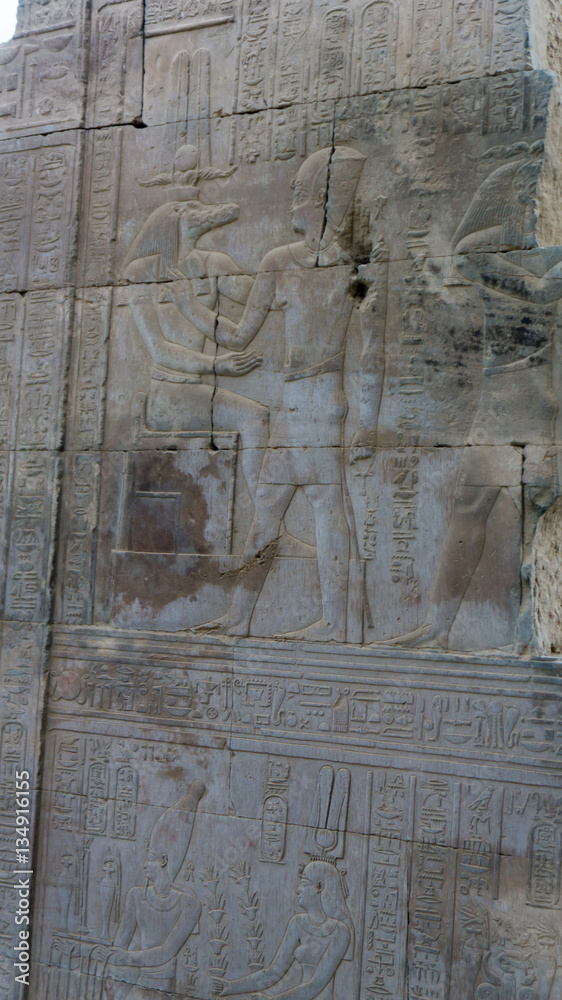 Egyptian ancient temple engravings on the wall