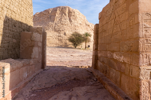 Egyptian ancient temple engravings on the wall photo