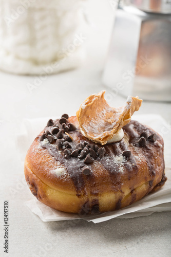 Cannoli donut on a white plate 