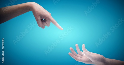 Composite image of cropped hand pointing