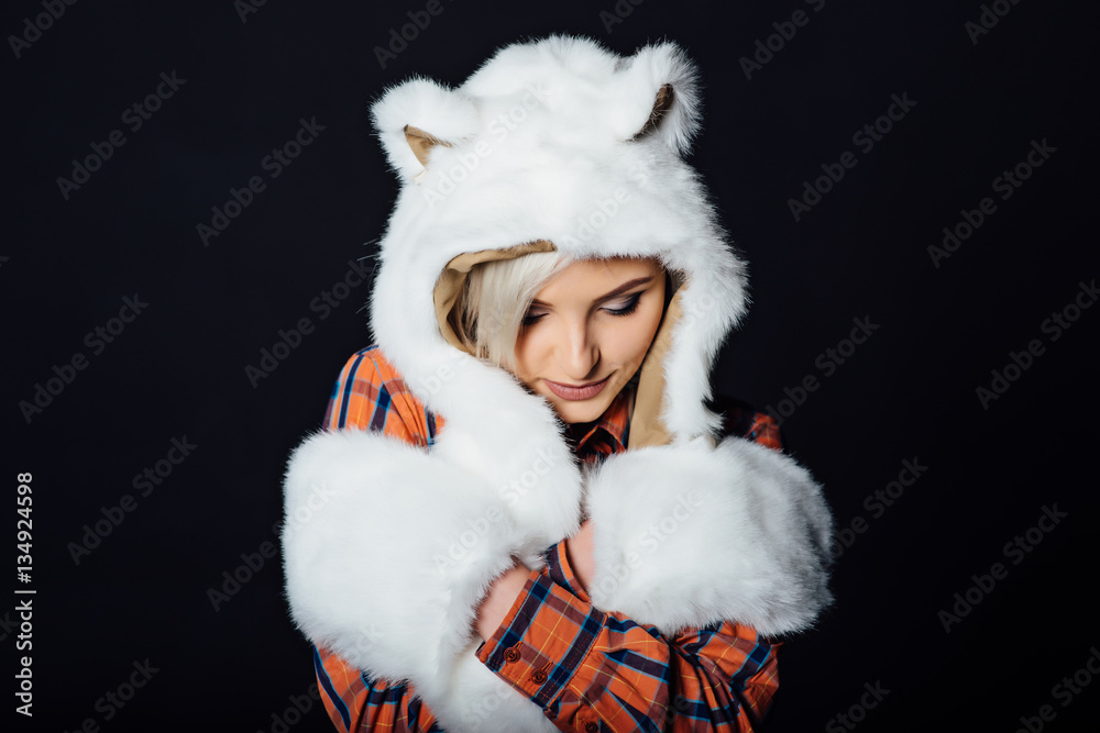 Obraz premium beautiful sexy girl wearing white fur hat