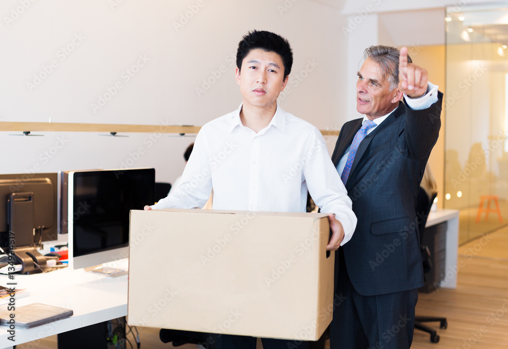 Young Employee Has Been Fired And Is Leaving Office Young Employee Has Been Fired And Is Leaving Office