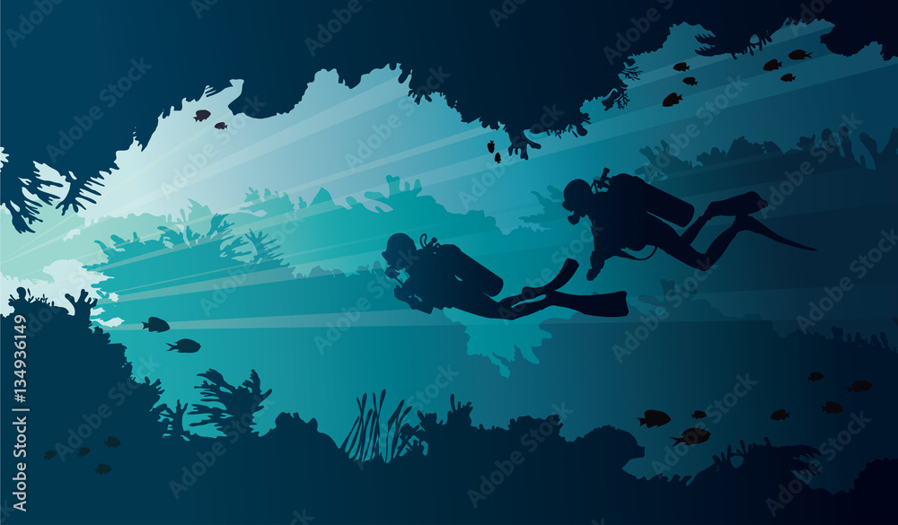 Underwater cave and scuba divers on a sea.