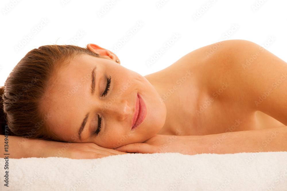 woman rests on white towel - conceptual photo for skin care and woman rests on white towel - conceptual photo for skin care and
