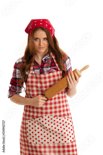 Beautiful young woman holds kitchen roller isolated over white b © Samo Trebizan