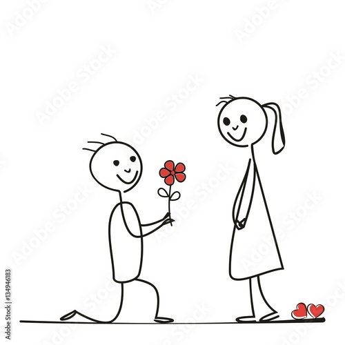 Gert kniet und macht einen Heiratsantrag mit einer Blume in den Händen