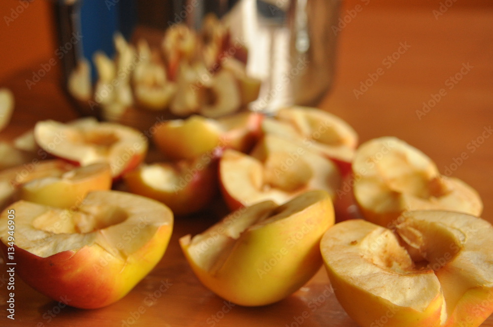 Sliced apples compote. Pot for preparing a beverage. Sliced apples compote. Pot for preparing a beverage.