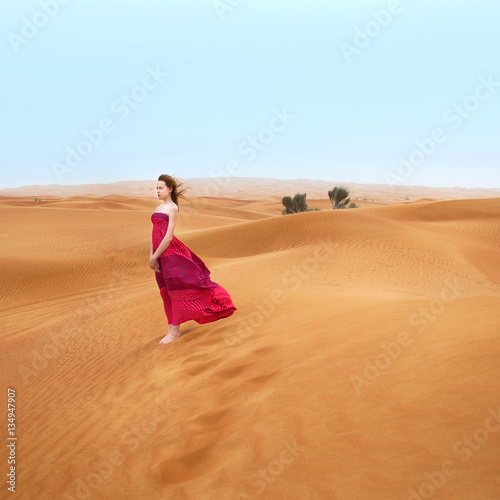beautiful young girl in desert in Dubai