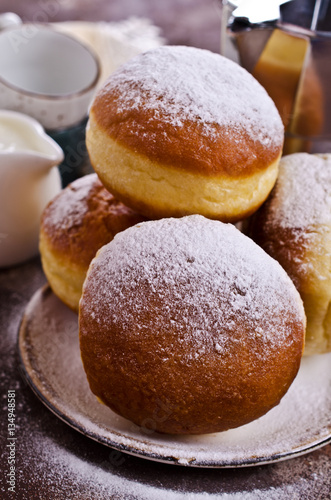 Traditional donuts with powdered sugar