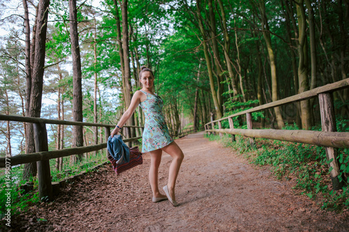 Young girl on a walk in the forest