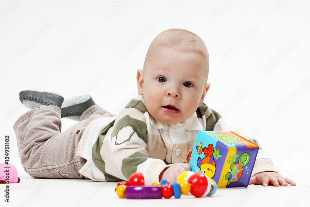 year-old child with toys on a white background year-old child with toys on a white background