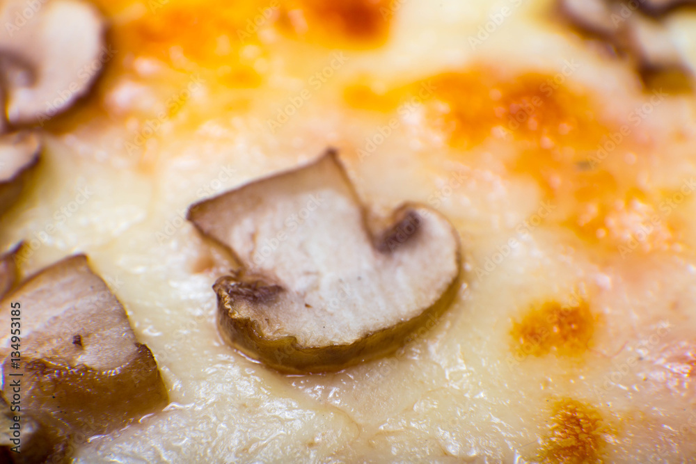 Four taste pizza with pepperoni cheese mushrooms and becon useful for background Four taste pizza with pepperoni cheese mushrooms and becon useful for background