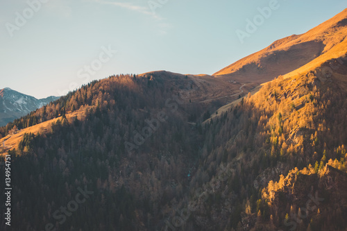 Slope of a mountain in autumn with forests