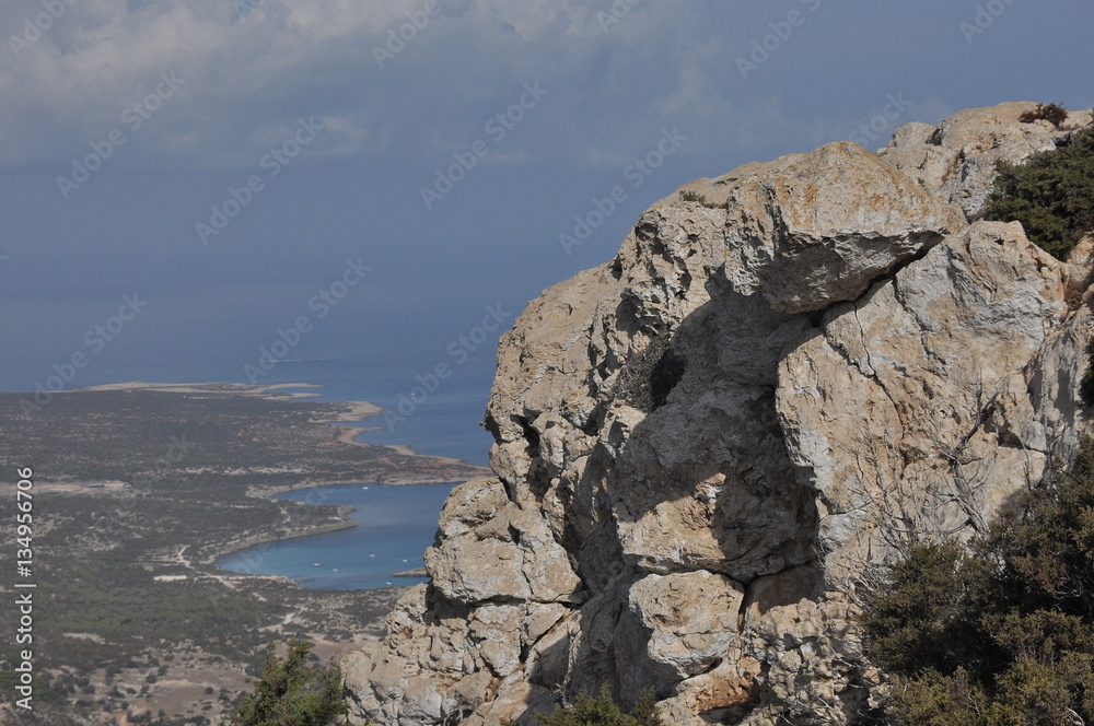 Akamas National Park in Cyprus. View from the mountains to the blue lagoon and the crystal clear water Akamas National Park in Cyprus. View from the mountains to the blue lagoon and the crystal clear water