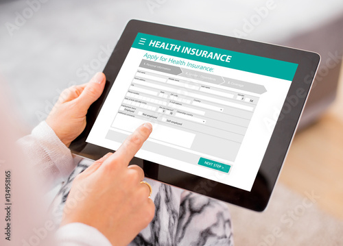 Fotografie Health insurance application on tablet