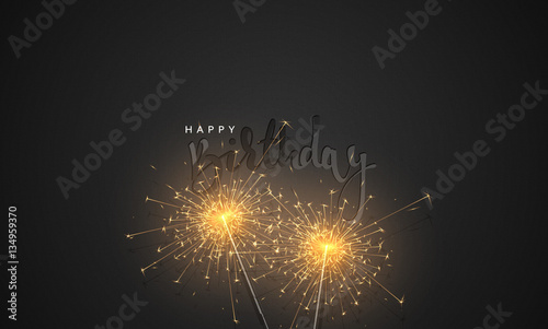 Happy Birthday black lettering with burning sparklers