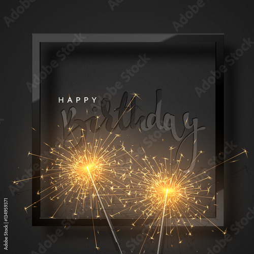 Happy Birthday black lettering with burning sparklers