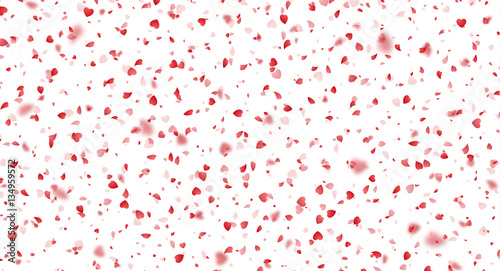 Valentines Day background of red hearts petals falling on white background. Symbol of love for the label gift packages. Flower petal in shape of heart confetti. Decor pink element for greeting cards.