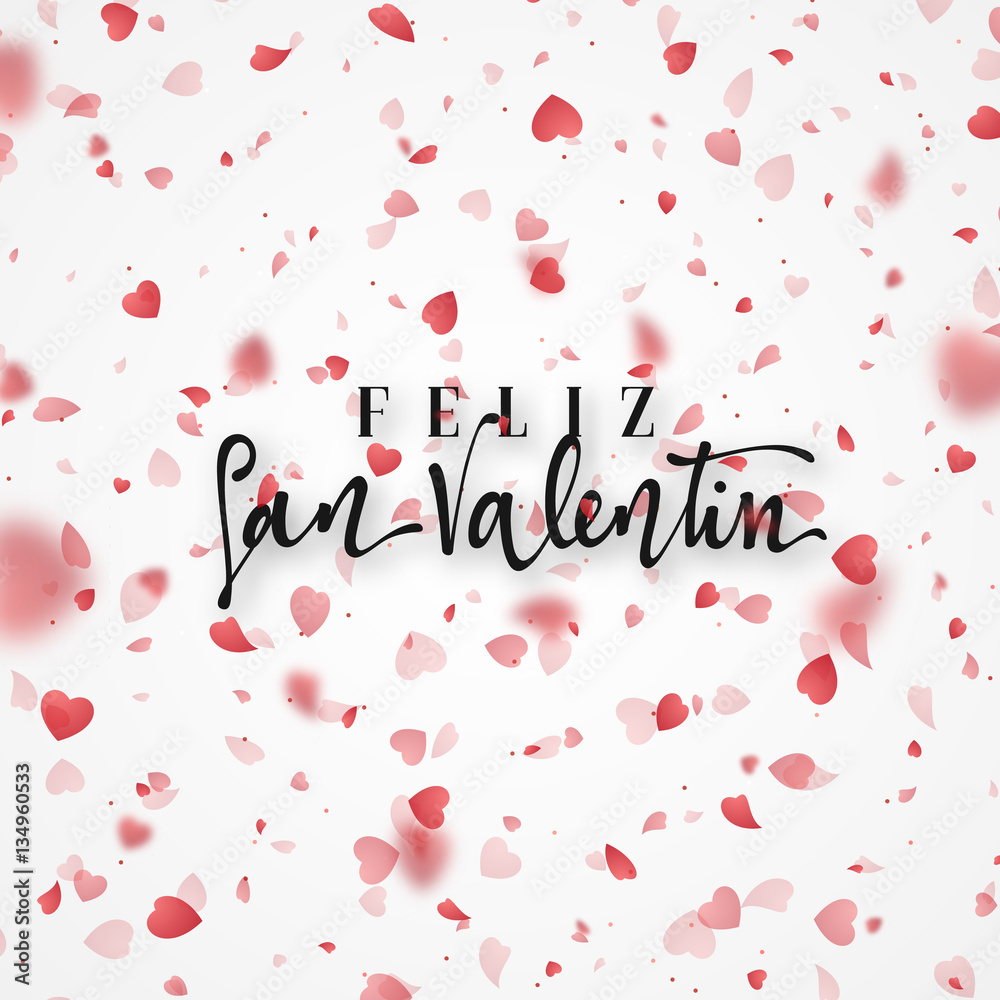 Happy Valentines Day. lettering Spanish Inscription handmade. Greeting card. Bright red hearts flying in the form of petals on a white background. Pink heart in frame.