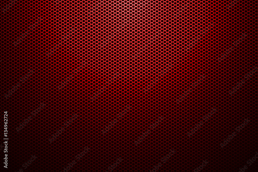 Obraz premium spotlight on red metallic mesh background.