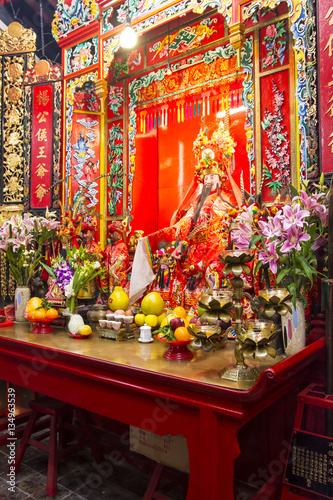 Holy statues and the offers on the altar in Yeung Hau temple in Tai O village, Hong Kong. © Sergio Delle Vedove