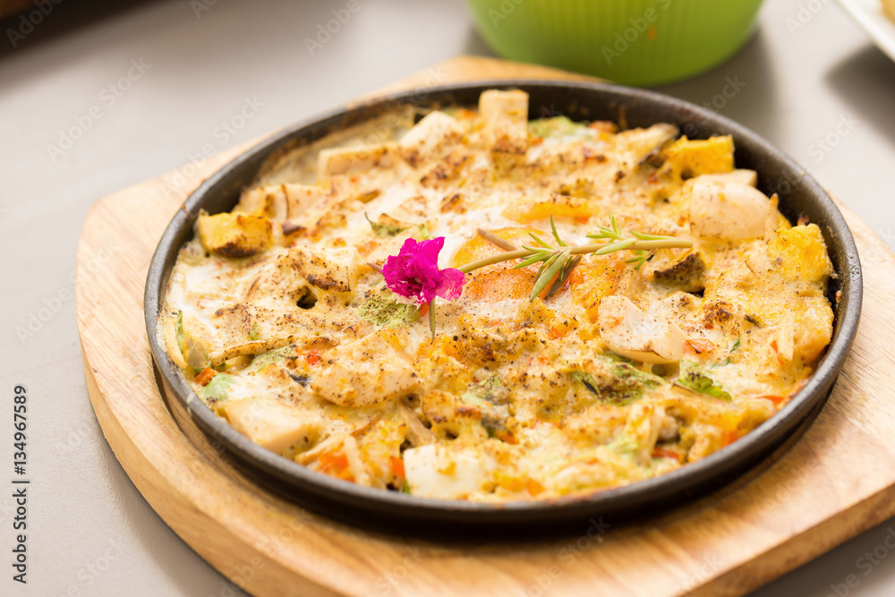 Hot plate Omelette eggs with salted fish and mushroom.