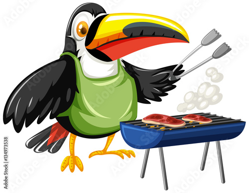 Toucan grilling two pieces of steak