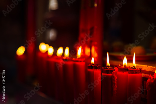 Red Candles Burning Candlelight Illuminated in the Night