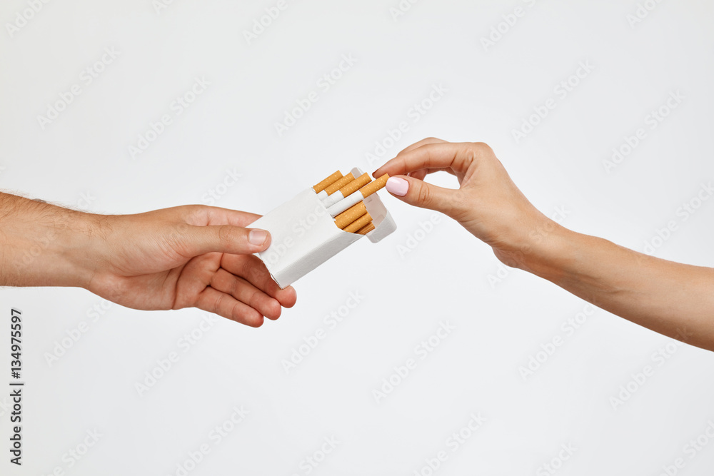 Smoking. Closeup Hand Holding Cigarettes Pack, Taking Cigarette Smoking. Closeup Hand Holding Cigarettes Pack, Taking Cigarette