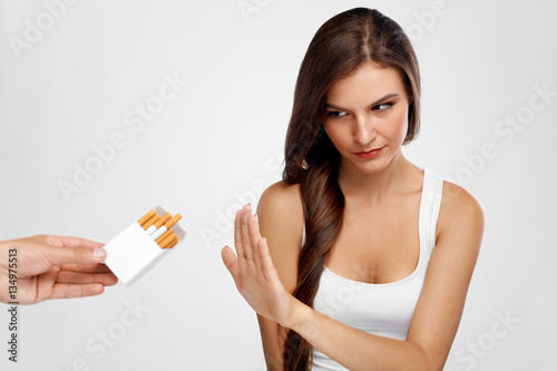 Beautiful Healthy Woman Quitting Smoking, Refusing Cigarettes.