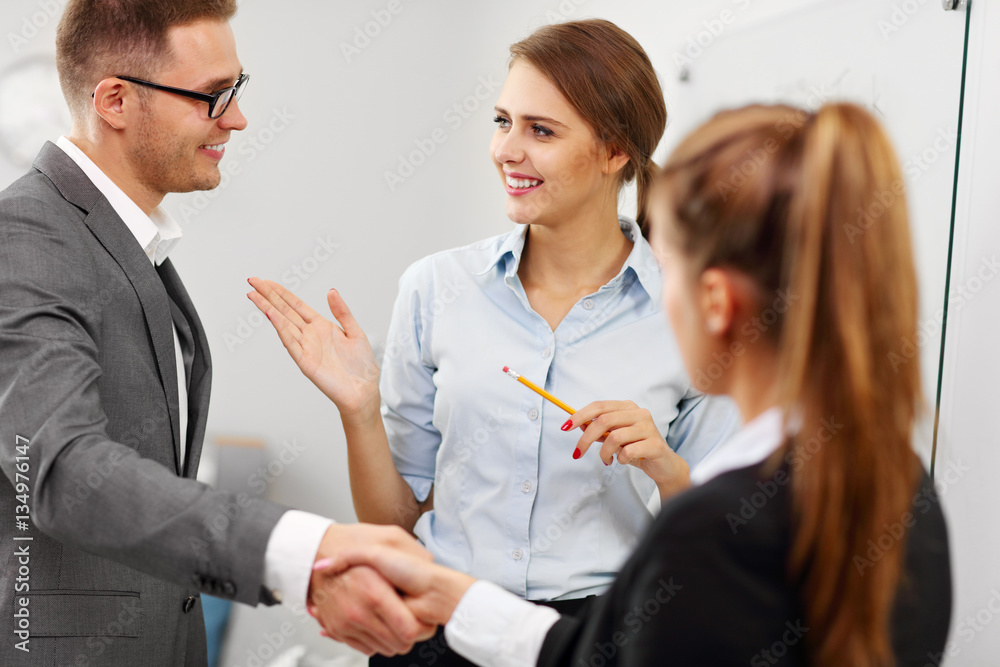 Manager introducing new worker to the team Manager introducing new worker to the team