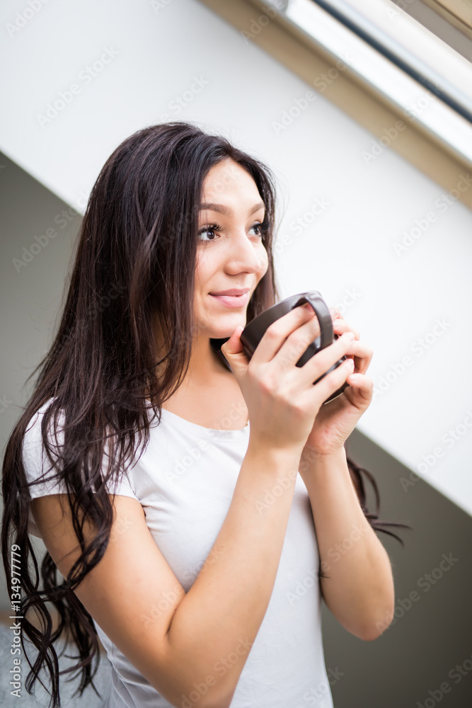 Portrait of beauty woman drink cup of tea or coffee in the morning bedroom Portrait of beauty woman drink cup of tea or coffee in the morning bedroom