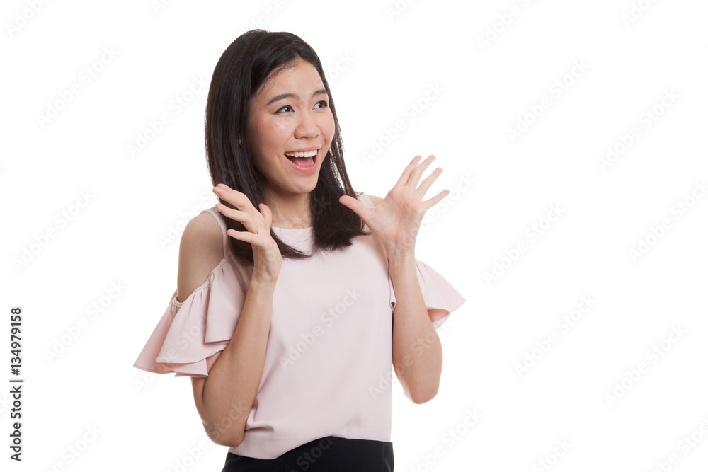 Young Asian business woman is surprised and smile. Young Asian business woman is surprised and smile.
