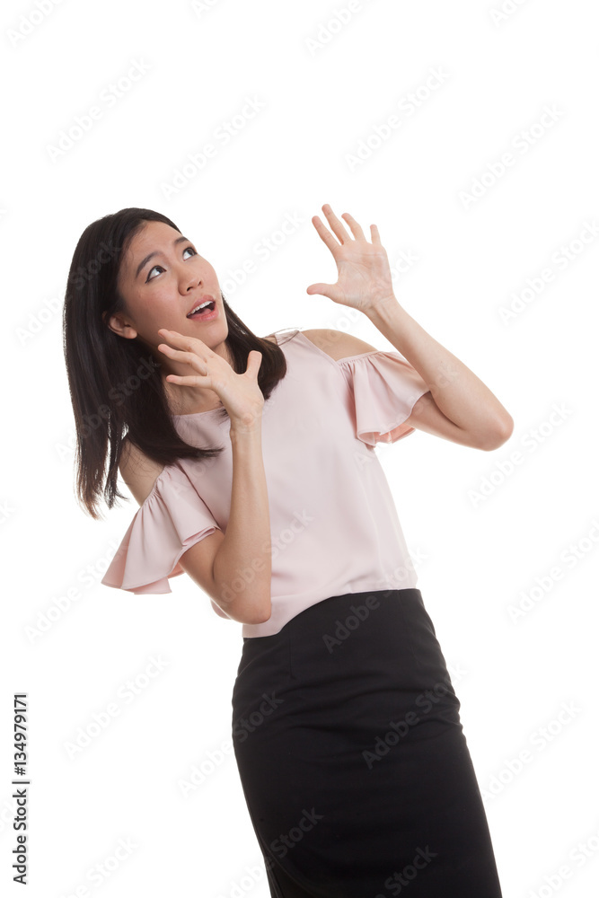 Excited young Asian business woman look up. Excited young Asian business woman look up.