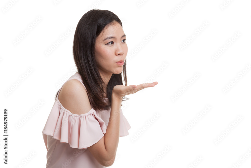 Beautiful young Asian woman blow a kiss. Beautiful young Asian woman blow a kiss.