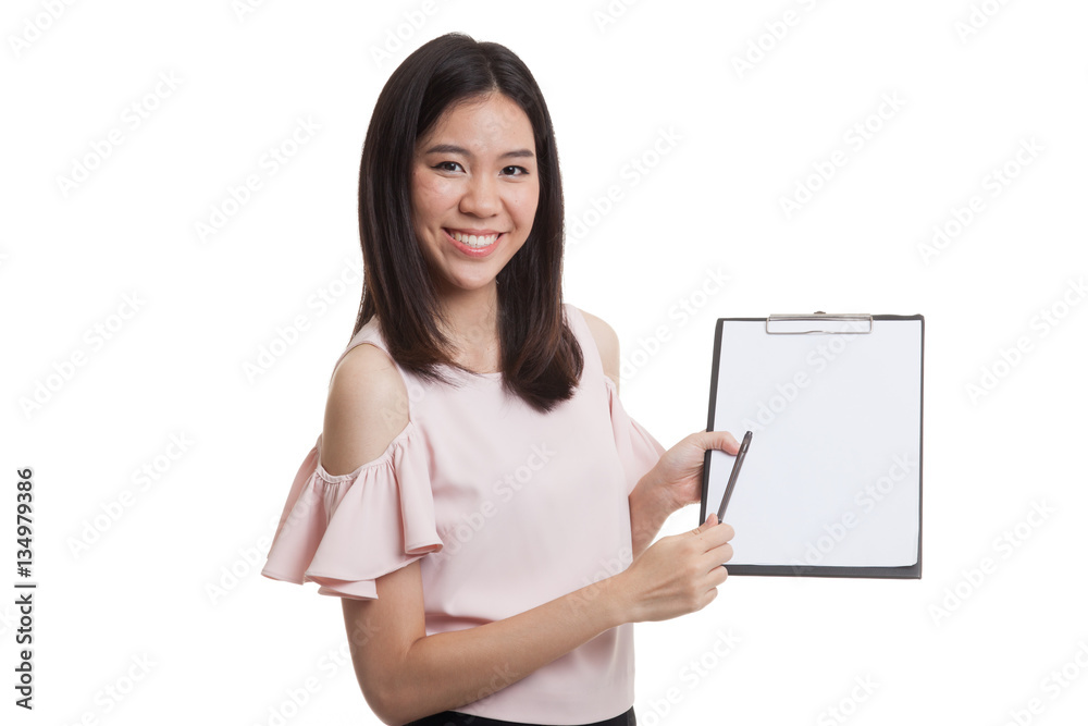 Happy Asian business woman point to clipboard with pen. Happy Asian business woman point to clipboard with pen.