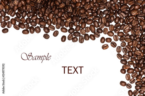 Fotótapéta Coffee beans background, roasted coffee beans on a white background, top view, a flat pattern, space for text