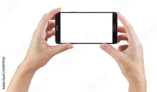 Female Hands Holding A Smart Phone with Blank Screen Isolated on a White Background.