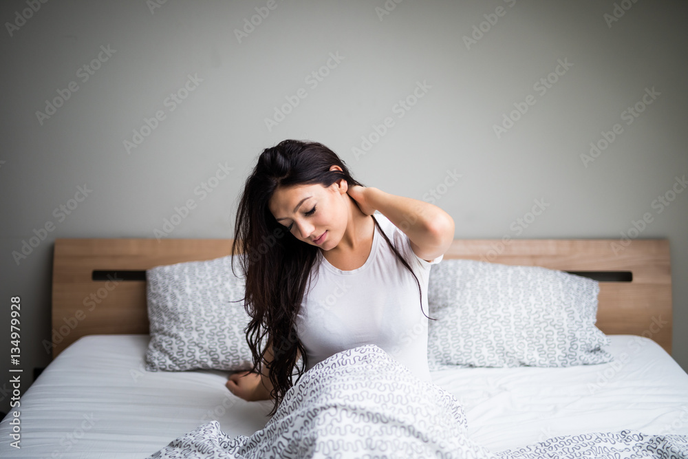 Young woman feel sick and unwell on bed Young woman feel sick and unwell on bed