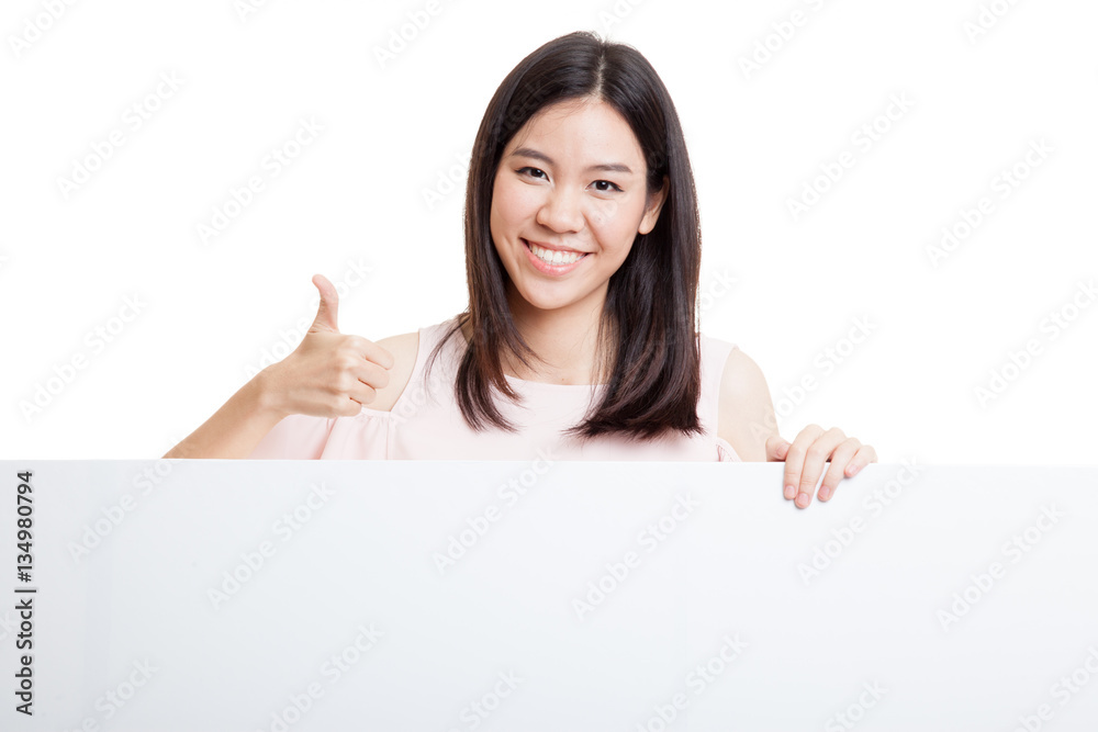 Young Asian woman show thumbs up with blank sign. Young Asian woman show thumbs up with blank sign.