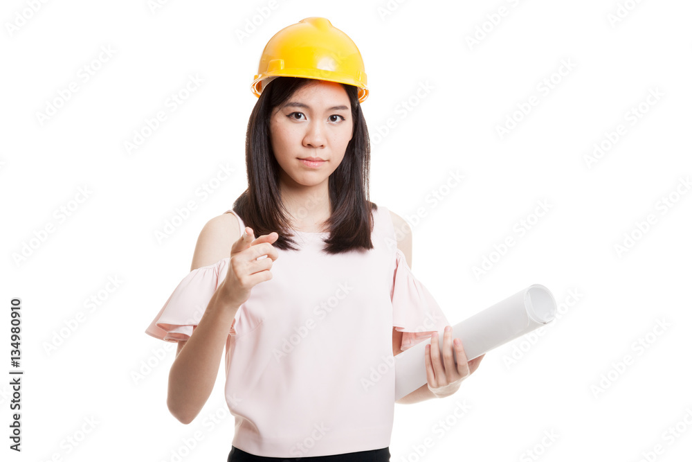 Asian engineer woman pointing with blueprints. Asian engineer woman pointing with blueprints.