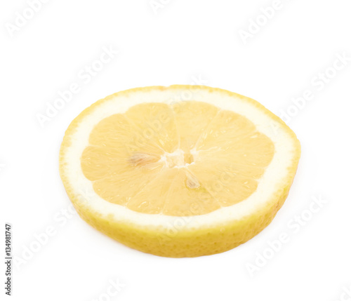 Single slice of a lemon isolated