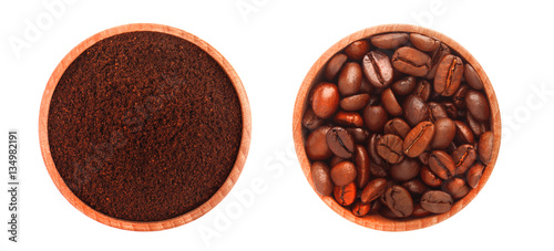 Two wooden plates with ground coffee and coffee beans, isolated on white background.