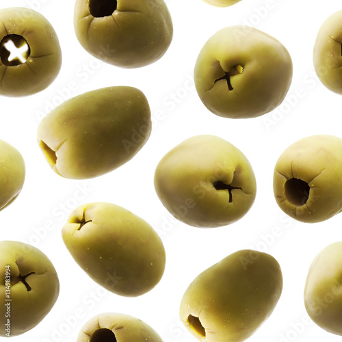 Green olives seamless photographic pattern. Isolated on white background without shadow. Ripe olives wallpaper. Green olive with hole, without pit. Olives background texture