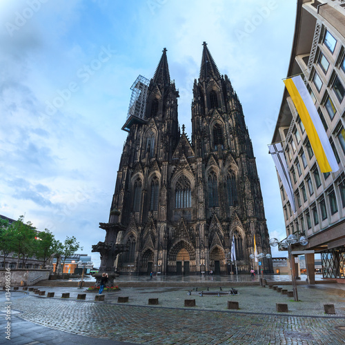 Cologne Cathedral on the west side and Square Roncalli in Cologne, Germany. The Dom - Roman Catholic Gothic cathedral photo