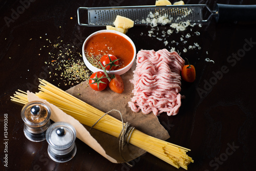 Food ingredients for pasta on black background