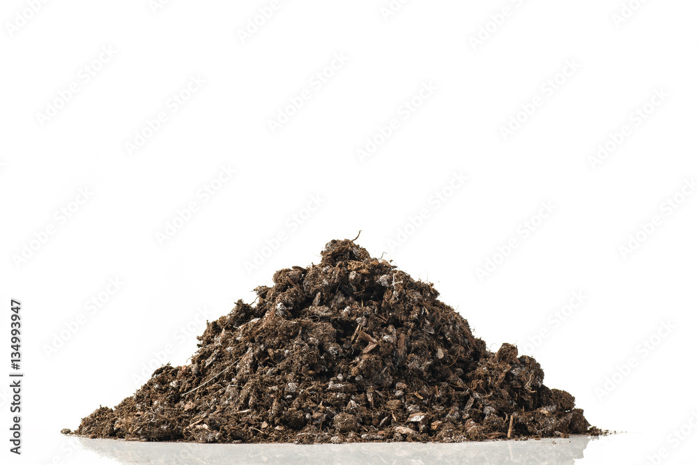 Fertile soil pile isolated on white background. Fertile soil pile isolated on white background.